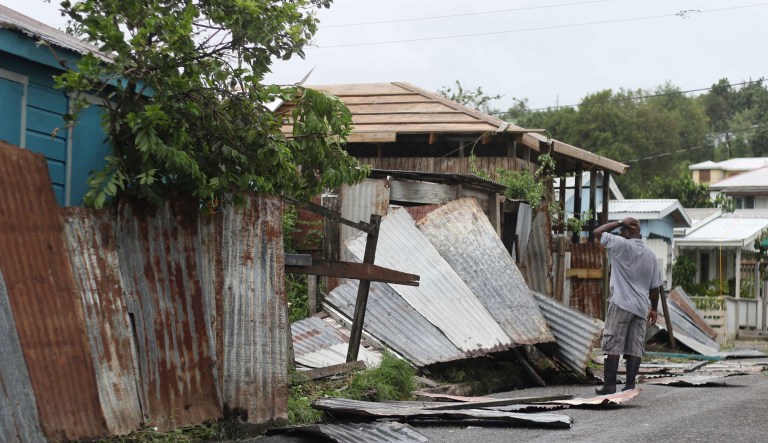 A man surveys the wreckage on his property after the passing of Hurricane Irma, in St. John's, Antigua and Barbuda, Wednesday. (AP Photo/Johnny Jno-Baptiste)