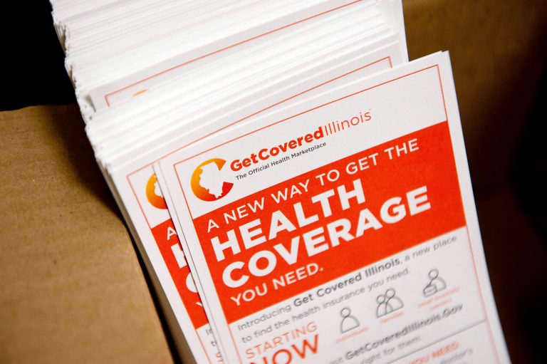 Fliers promoting the Get Covered Illinois health insurance marketplace sit in a box at the Bureau County Health Department offices in Princeton, Illinois, U.S., on Wednesday, Dec. 18, 2013. TodayÃ­s deadline for Americans to sign up for Obamacare health coverage effective Jan. 1 was extended until midnight tomorrow as heavy traffic to the online enrollment system caused a queuing system to be activated. (Bloomberg)