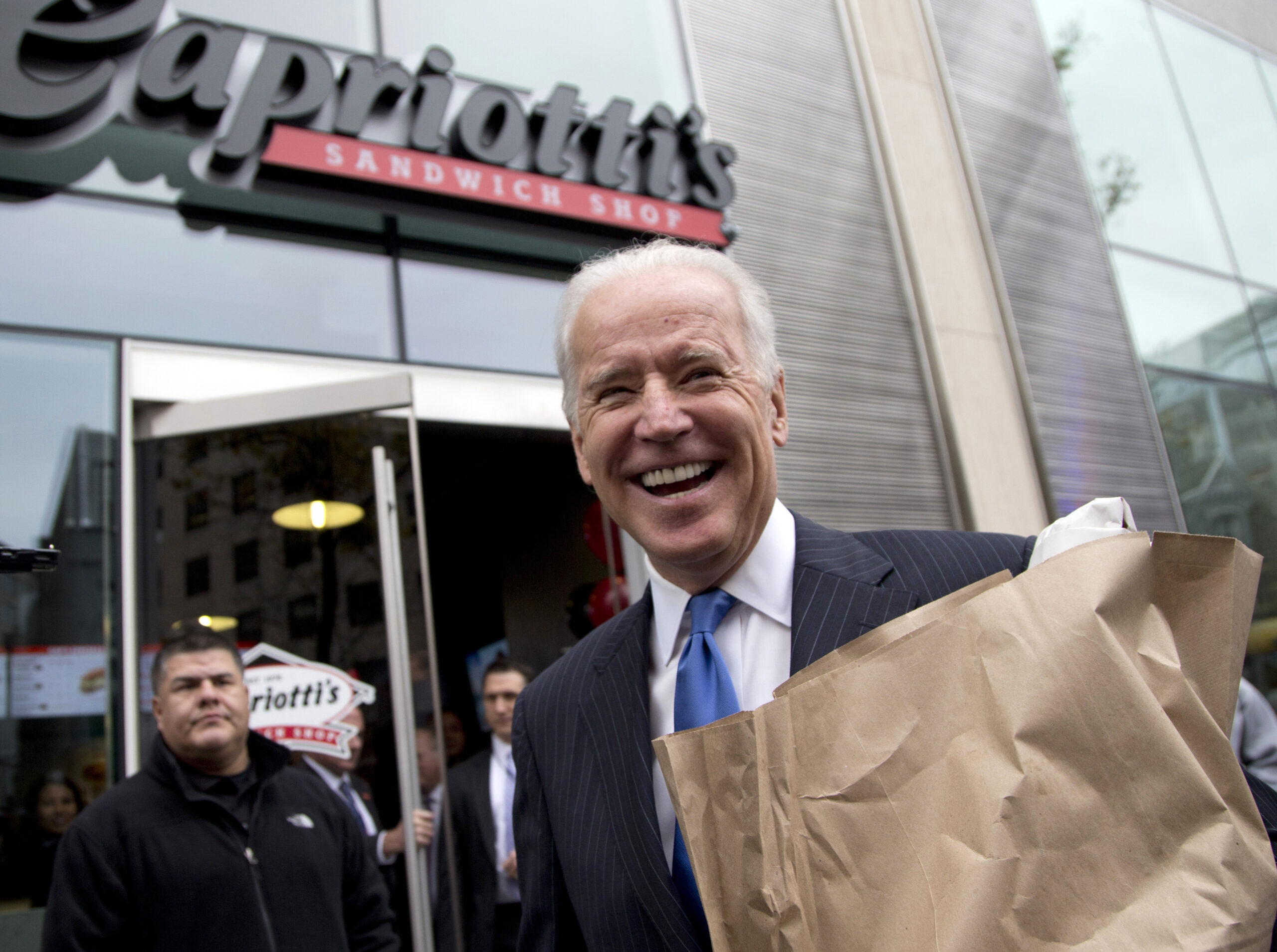 Biden seeks center in Obama’s sphere of influence