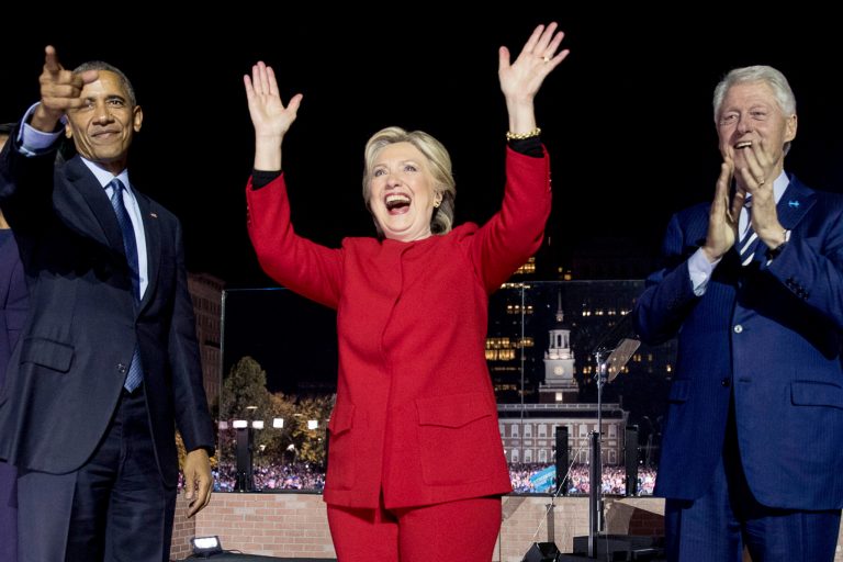 Democratic presidential candidate Hillary Clinton, center, is joined on stage by President Barack Obama left, and former President Bill Clinton, right, after speaking at a rally at Independence Mall in Philadelphia, Monday, Nov. 7, 2016. (AP Photo/Andrew Harnik)