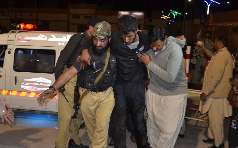 At least 41 police trainees were killed and more than 100 others wounded on Monday when terrorists detonated explosives and opened fire at a training center in Quetta, Pakistan. (AP Photo/Arshad Butt)