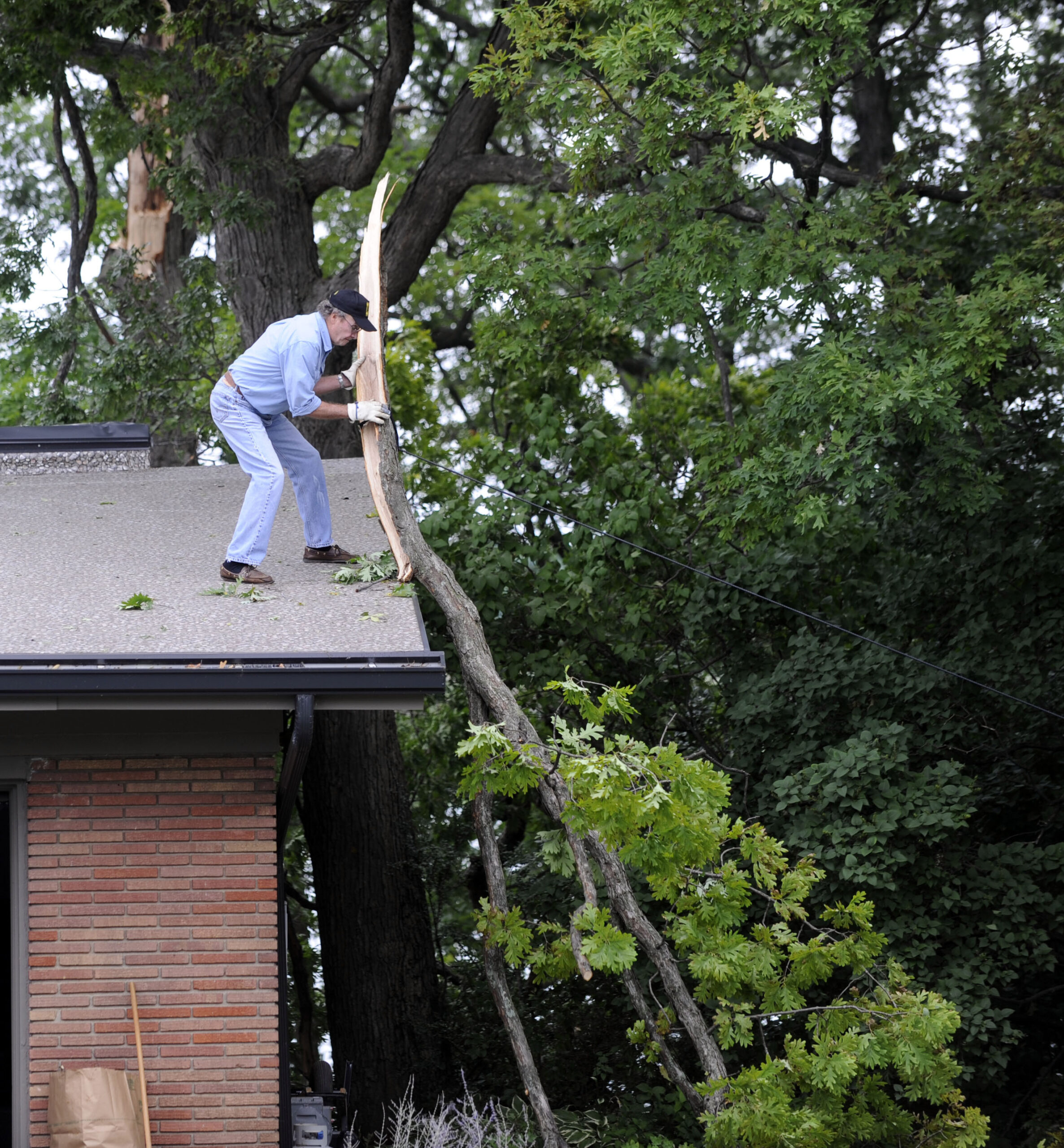 Utility works to restore power in Michigan