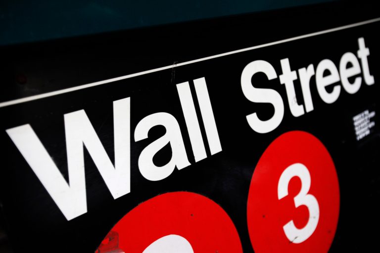 FILE - This Jan. 4, 2010 file photo shows an entrance to a Wall Street subway station in New York. U.S. stocks are opening higher Monday, Aug. 11, 2014, as tensions ease in Ukraine.  (AP Photo/Mark Lennihan, File)