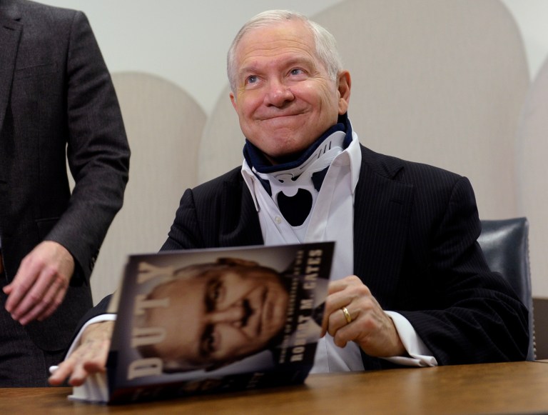 Former Defense Secretary Robert Gates signs copies of his new book: 