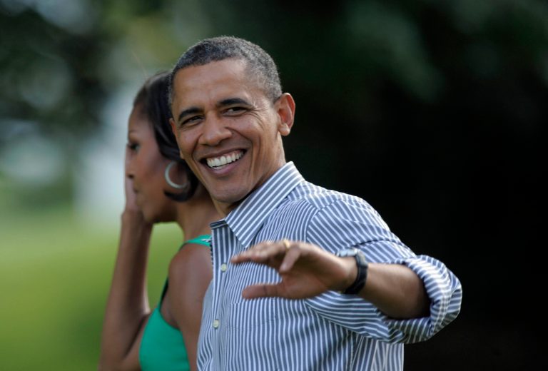 President Barack Obama and first lady Michelle Obama arrive at the Congressional picnic on the South Lawn of the White House in Washington, Wednesday, June 27, 2012. (AP Photo/Susan Walsh)