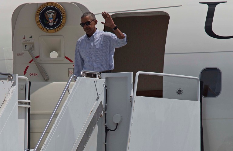 President Obama arrives at the Baton Rouge Metropolitan Airport, Tuesday, Aug. 23, 2016, to survey the flood-damaged region. (AP Photo/Max Becherer)