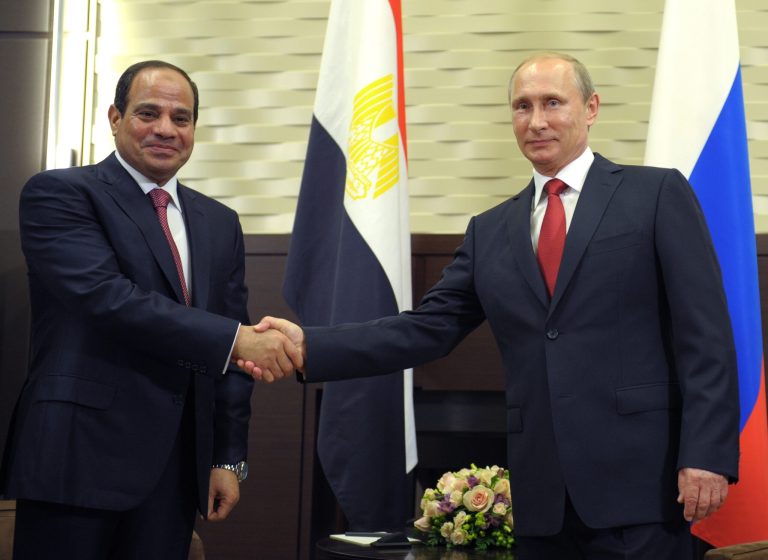 Russian President Vladimir Putin, right, and Egyptian President Abdel-Fattah el-Sissi shake hands during a meeting in the Russian Black Sea resort of Sochi, Russia, Tuesday, Aug. 12, 2014. Egyptian President Abdel-Fattah el-Sissi arrived in Russia on Tuesday for his first official visit as president and was immediately shown a selection of Russian military hardware for sale.  (AP Photo/RIA Novosti, Alexei Druzhinin, Presidential Press Service)