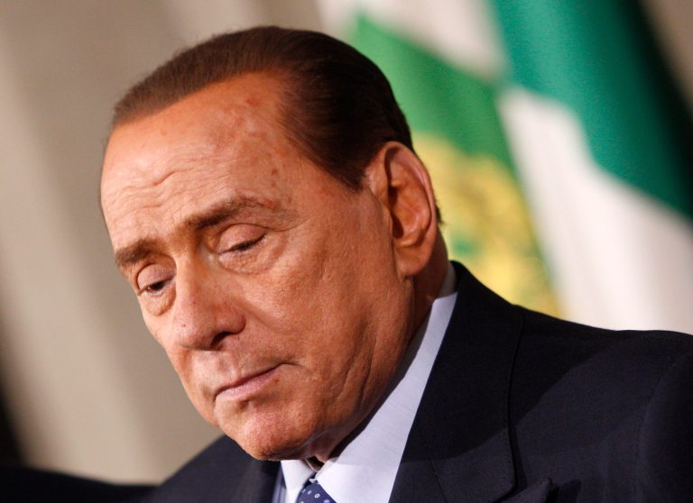 Forza Italia party's leader Silvio Berlusconi talks to journalists after talks with Italian President Giorgio Napolitano, at the Quirinale presidential palace, in Rome, Saturday, Feb. 15, 2014. Berlusconi was among the political leaders who met Saturday with Italy's president, who is feeling out political leaders to determine if Democratic Party leader Matteo Renzi has enough support to form a new government after he sidelined outgoing Premier Enrico Letta, a rival Democrat. Berlusconi has pledged that his Forza Italia party will be a 