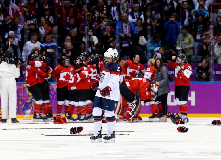 Michelle Picard of the United States (23) skates back to the bench after Canada scored in overtime to win the women's gold medal ice hockey game 3-2 at the 2014 Winter Olympics, Thursday, Feb. 20, 2014, in Sochi, Russia. (AP Photo/Matt Slocum)