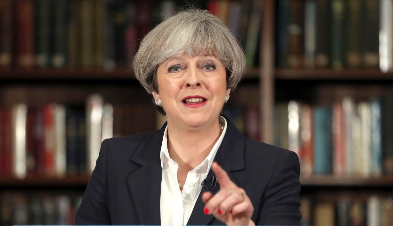 Britain's Prime Minister Theresa May said Monday the United Kingdom's threat level would remain at 