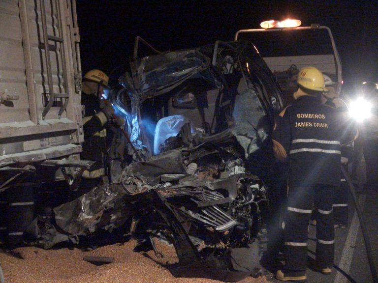 Firefighters inspect the car of Emanuel Bergoglio, nephew to Pope Francis, which crashed with a truck in James Craik, Argentina, early Tuesday, Aug. 19, 2014. Emanuel Bergoglio was seriously wounded as two young great-nephews of Pope Francis as well as their mother, the wife of the pope's nephew, were killed in the crash, according to the Vatican and a local police official. (AP Photo/Marco Salva)