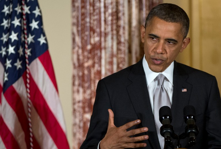   President Barack Obama speaks at the Diplomatic Corps Holiday Reception at the State Department, Wednesday, Dec. 19, 2012, in Washington. (AP Photo/Carolyn Kaster)  