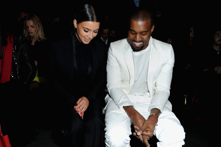 PARIS, FRANCE - MARCH 03:  Kim Kardashian and Kanye West attend Givenchy  Fall/Winter 2013 Ready-to-Wear show as part of Paris Fashion Week on March 3, 2013 in Paris, France.  (Photo by Pascal Le Segretain/Getty Images)
