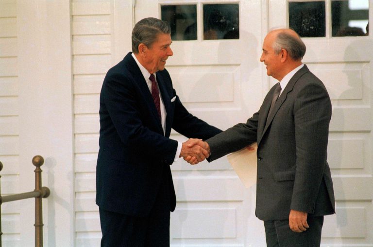 President Ronald Reagan and Soviet leader Mikhail Gorbachev shake hands as they leave the Hofdi in Reykjavik after their third session of talks in Reykjavik, Oct. 12, 1986. (AP Photo/Bob Daugherty)