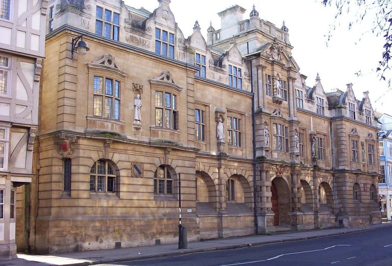 For what it's worth, the guano-encrusted statue of Cecil Rhodes, which is lodged in a little niche above some permanently closed gates at my old college, Oriel, is barely noticeable. (Wikimedia Commons)