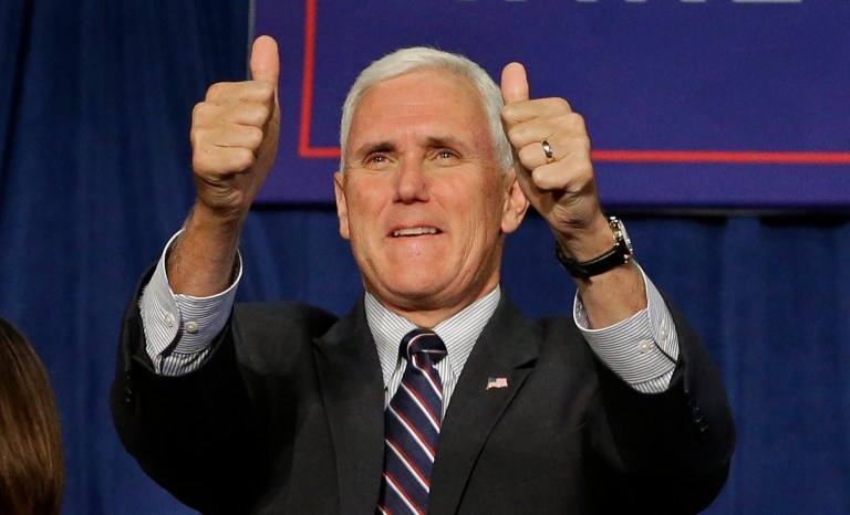 Hillary Clinton's campaign responded to Gov. Mike Pence's releasing his tax returns Friday evening with more praise of the rival than rebuke. (AP Photo/Chuck Burton)