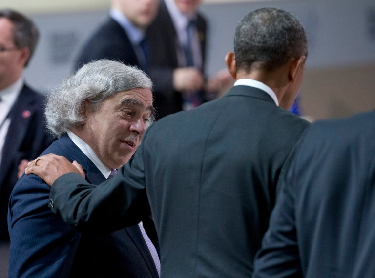 Pictured above, Energy Secretary Ernest Moniz is greeted by President Obama. Although the White House says it appreciates that some of the Energy Department's programs have been adequately funded in the House energy and water spending bill, overall the legislation doesn't pass muster to achieve Obama's clean energy goals. (AP Photo/Alex Brandon)
