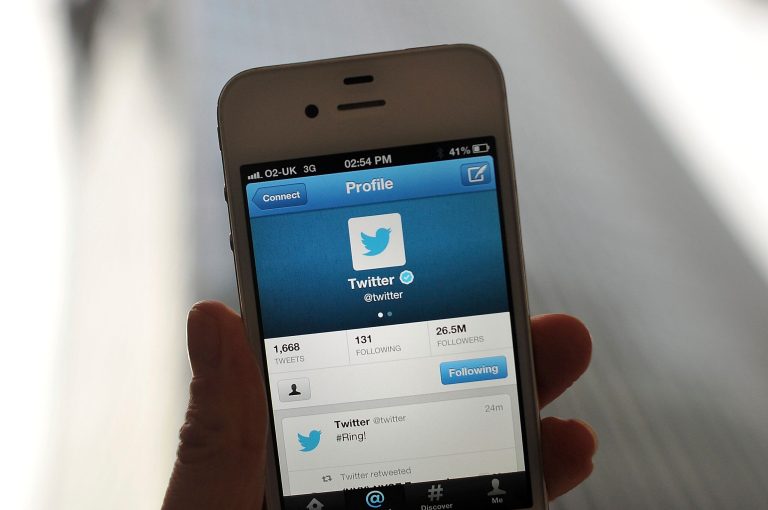 The Twitter logo and is displayed on a mobile device. (Bethany Clarke/Getty Images)