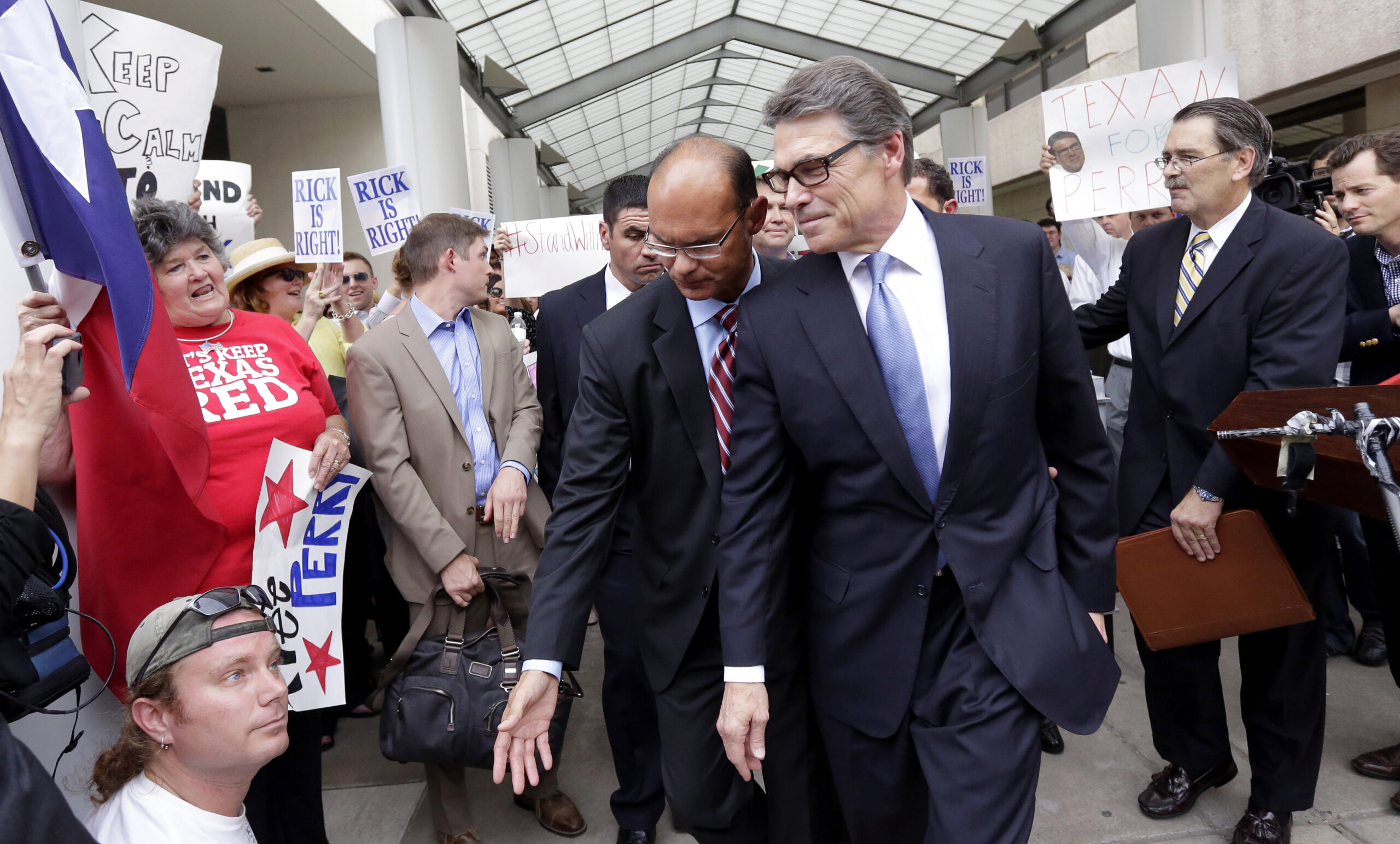 Rick Perry hires legal dream team