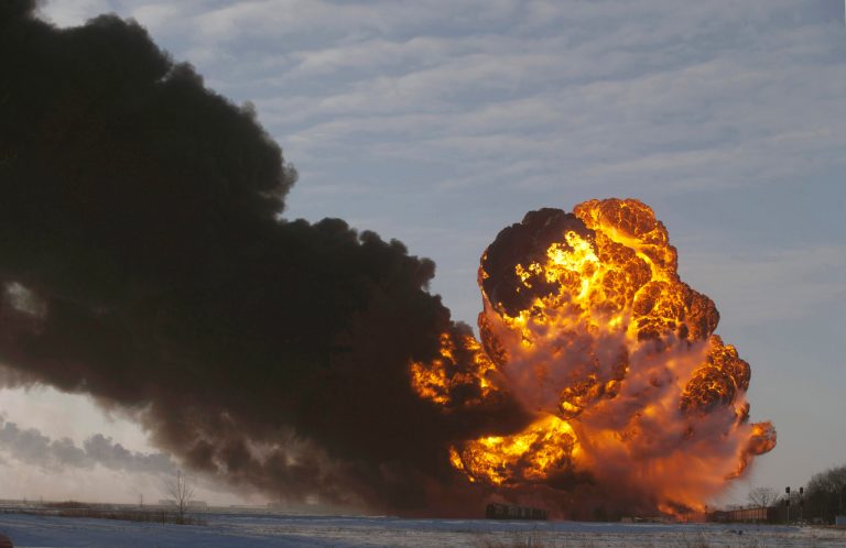 In this Dec. 30, 2013 file photo, a fireball goes up at the site of an oil train derailment near Casselton, N.D.Â A train carrying oil derailed and exploded in North Dakota on Wednesday, nearly a week after federal regulators issued aggressive new standards to guard against tanker car disasters.Â (AP Photo/Bruce Crummy, File)