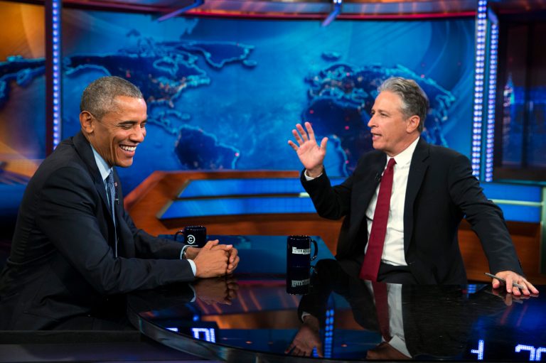 President Barack Obama, left, talks with Jon Stewart, host of 