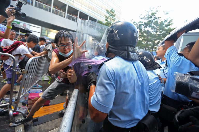 HK students scuffle with police in chaotic protest