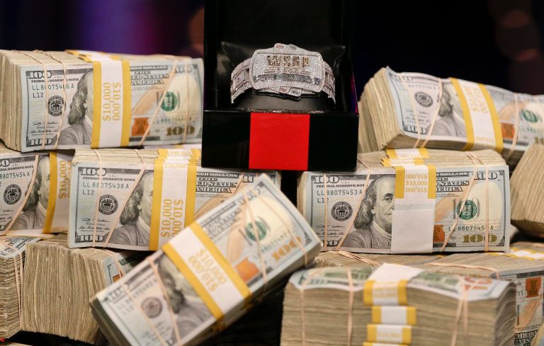 National debt will make World Series of Poker purse look tiny. (AP Photo/Julie Jacobson)