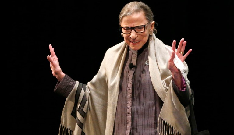 U.S. Supreme Court Justice Ruth Bader Ginsburg acknowledges the crowd's applause before participating in a conversation with Judge Ann Claire Williams of the U.S. Court of Appeals for the Seventh Circuit at Roosevelt University Monday, Sept. 11, 2017, in Chicago. (AP Photo/Charles Rex Arbogast)