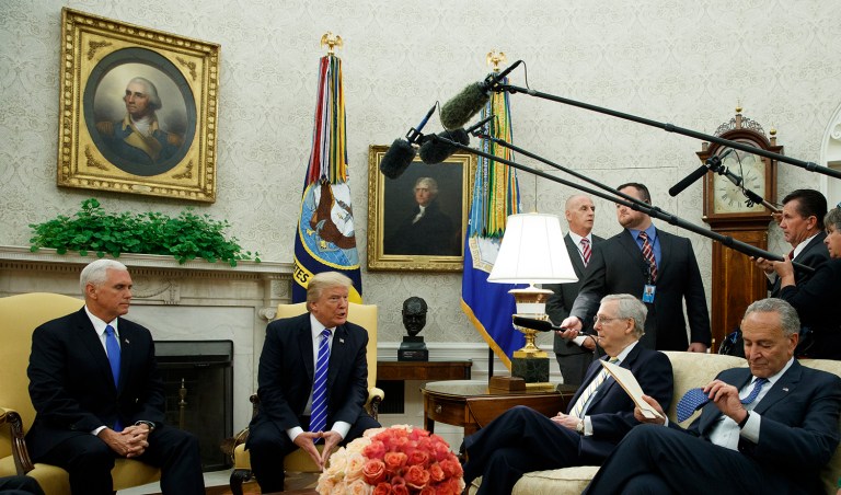 Trump struck a deal Wednesday with Nancy Pelosi and Chuck Schumer to raise the debt ceiling and assure government funding until Dec. 15. (AP Photo/Evan Vucci)