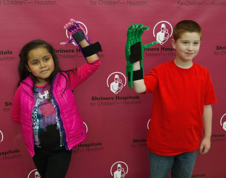 Shriners Hospital For Children-Houston and Marvel Universal Live performers help assemble 3D mechanical hands at Shriners Childrens Hospital on February 5, 2015 in Houston, Texas. (Photo by Bob Levey/Getty Images for Feld Entertainment)