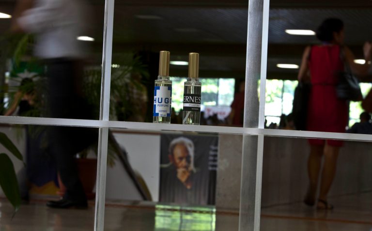 Two bottles of cologne, one called 