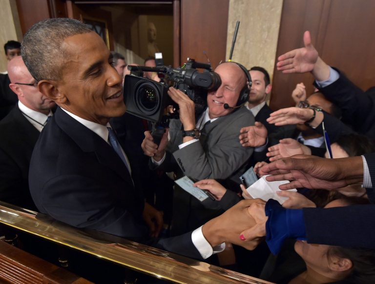 President Barack Obama shakes hands after delivering the State of the Union address before a joint session of Congress on Tuesday, Jan. 20, 2015, on Capitol Hill in Washington. (AP Photo/Mandel Ngan, Pool)