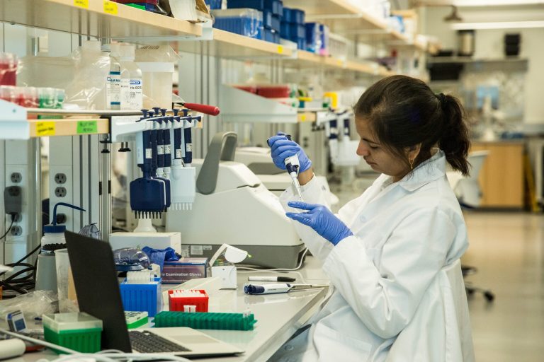 Research technicians prepare DNA samples in the production lab of the New York Genome Center. The relatively low cost of genomic sequencing is one reason personalized medicine seems promising. (Getty File Photo)