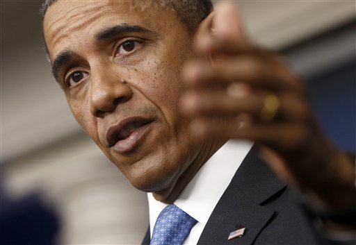 President Barack Obama answers questions during his new conference in the Brady Press Briefing Room of the White House in Washington, Tuesday, April 30, 2013. The president strongly suggested Tuesday he'd consider military action against Syria if it can be confirmed that President Bashar Assad's government used chemical weapons in the two-year-old civil war. (AP Photo/Charles Dharapak)