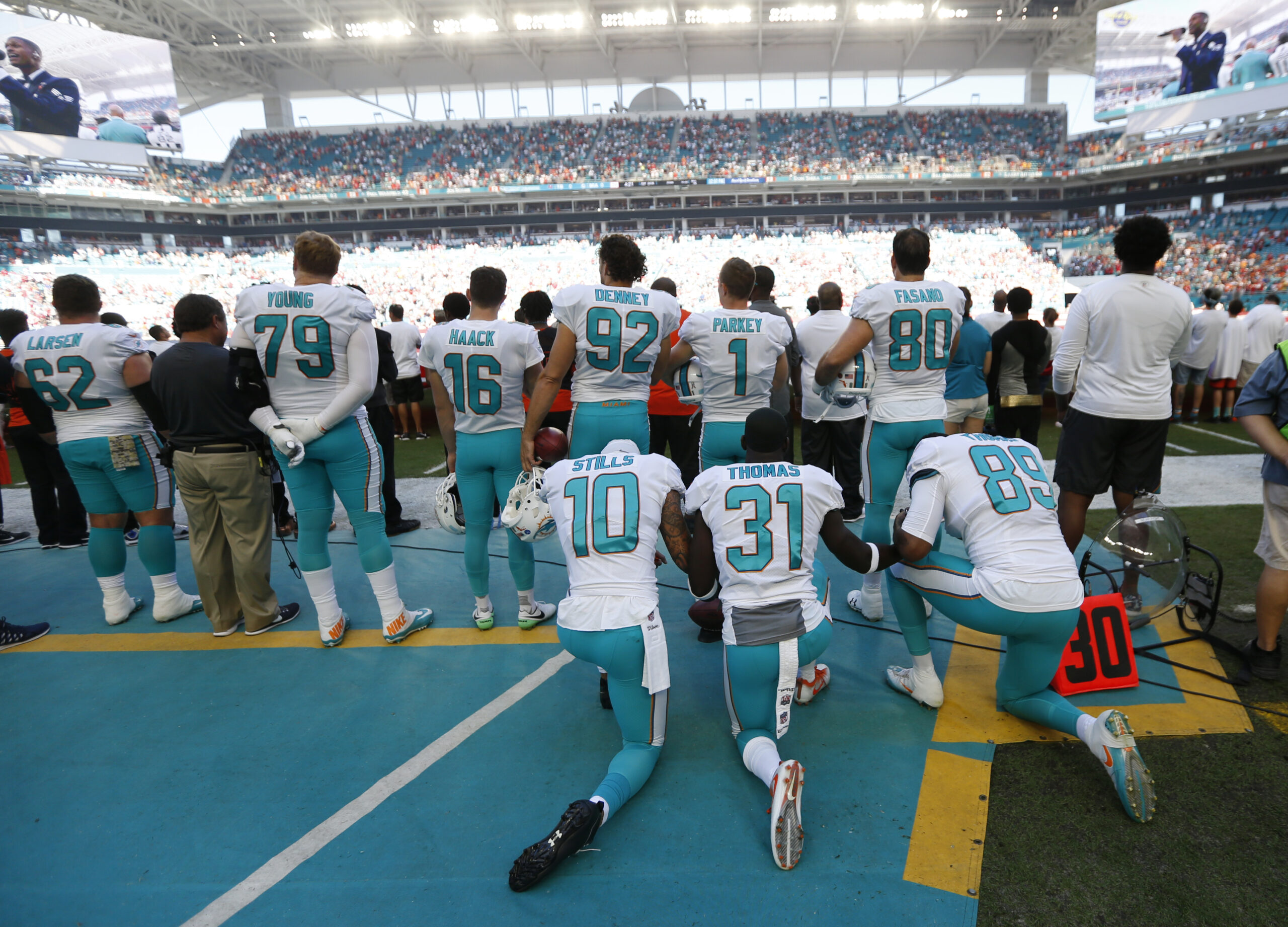 Miami Dolphins players kneel in protest during anthem ahead of Thanksgiving weekend game