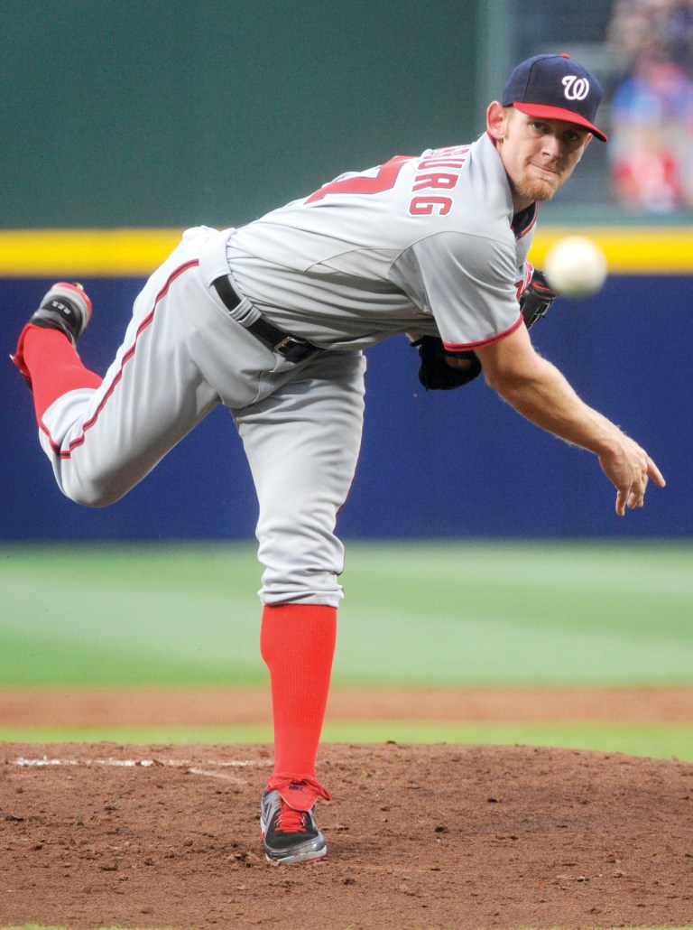 John Amis/AP
Nationals pitcher Stephen Strasburg ended his career-worst streak of losses in four straight starts, but the bullpen gave up the lead after he departed as Atlanta beat Washington.