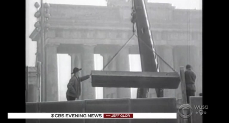 Berlin Wall under construction along the Iron Curtain.