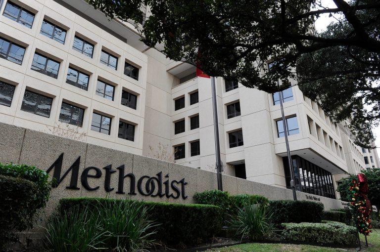   Trees and shrubs line the street in front of Methodist Hospital in Houston's Medical Center Thursday, Nov. 29, 2012. Former President George H.W. Bush is at Methodist for treatment of a lingering cough. (AP Photo/Pat Sullivan)  