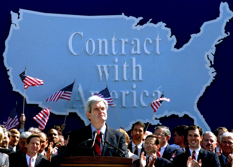 In this Sept. 27, 1994 photo, then-House Minority Whip Rep. Newt Gingrich, D-Ga., addresses Republican congressional candidates on Capitol Hill during a rally where they pledged a 