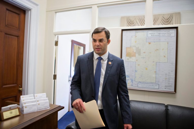 Rep. Justin Amash, R-Mich., leaves his office to walk to the House of Representatives where his amendment to the Defense spending bill would cut funding to the National Security Agency's program that collects the phone records of U.S. citizens and residents, on Capitol Hill, Wednesday, July 24. (AP/J. Scott Applewhite)