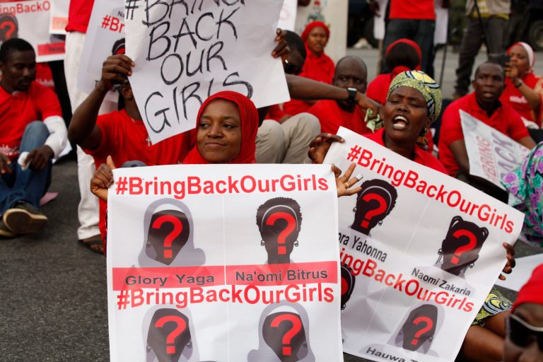 People attend a demonstration calling on the government to rescue the kidnapped girls of the government secondary school in Chibok, in Abuja, Nigeria, Thursday. (AP/Sunday Alamba)