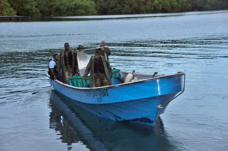 Jamaican Defence Force members return to Port Antonio Marina in Portland, Jamaica, Saturday, Sept. 6, 2014, after a fruitless search for a plane that crashed into the ocean. Rescue crews searching off Jamaica's coast on Saturday said they could no longer see debris spotted earlier, stymieing efforts to solve the mystery surrounding a small plane carrying a prominent upstate New York couple that went on a ghostly 1,700-mile journey after the pilot was apparently incapacitated. Jamaican officials said that possible wreckage from the single-engine turboprop Socata TBM700 was sighted Friday evening by a military aircraft flying off the island's northeast coast, drifting roughly 24 miles off the coastal town of Port Antonio. (AP Photo/Everard Owen)