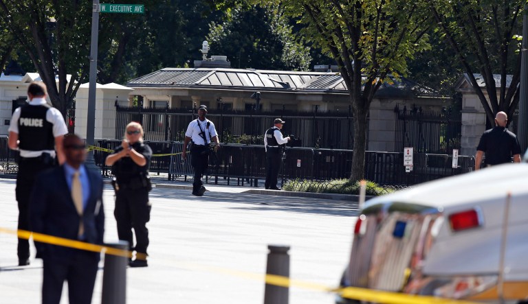 Members of the Secret Service arrested a man near the White House on Sunday for public urination and found nine guns and three knives in his car after taking him into custody. (AP Photo/Alex Brandon)
