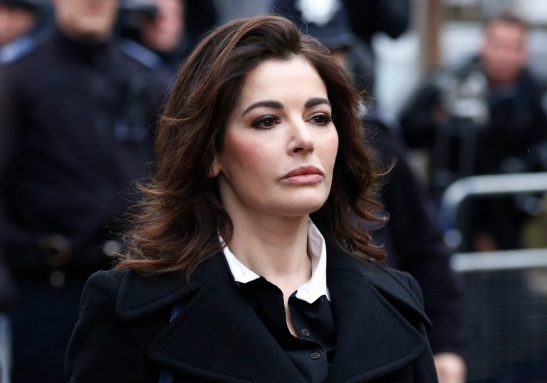 FILE - In this Wednesday, Dec. 4, 2013 file photo, British chef Nigella Lawson arrives at Isleworth Crown Court in London. The U.S. Embassy in London said on Thursday, April 3, 2014 that Lawson was denied permission to board a flight to the United States on the weekend. The embassy did not disclose the reason for refusing Lawson. (AP Photo/Sang Tan, File)