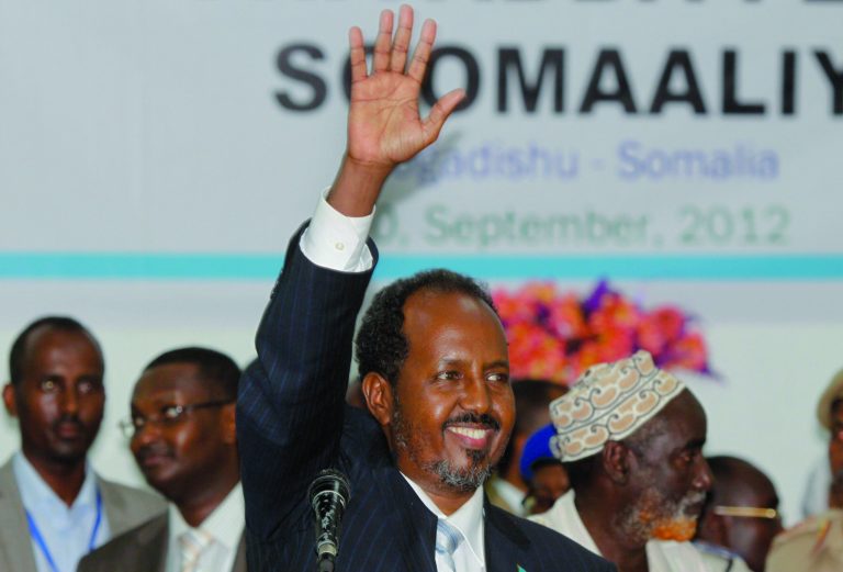 Somalia's new president Hassan Sheikh Mohamud, a political newcomer, speaks at a ceremony after being elected by the Parliament over outgoing President Sheik Sharif Sheikh Ahmed who conceded defeat, in Mogadishu, Somalia Monday, Sept. 10, 2012. Somalia's Parliament elected a new president of the country's fledgling government Monday, a move that members of the international community say is a key step toward the east African nation's transition from a war-torn failed state to a nation with an effective government. (AP Photo/Farah Abdi Warsameh)