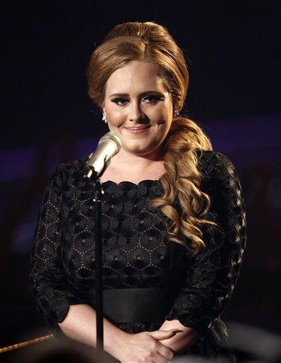 On Adele's new album, the British singer shows off her raw and soulful voice as she laments a recent breakup.