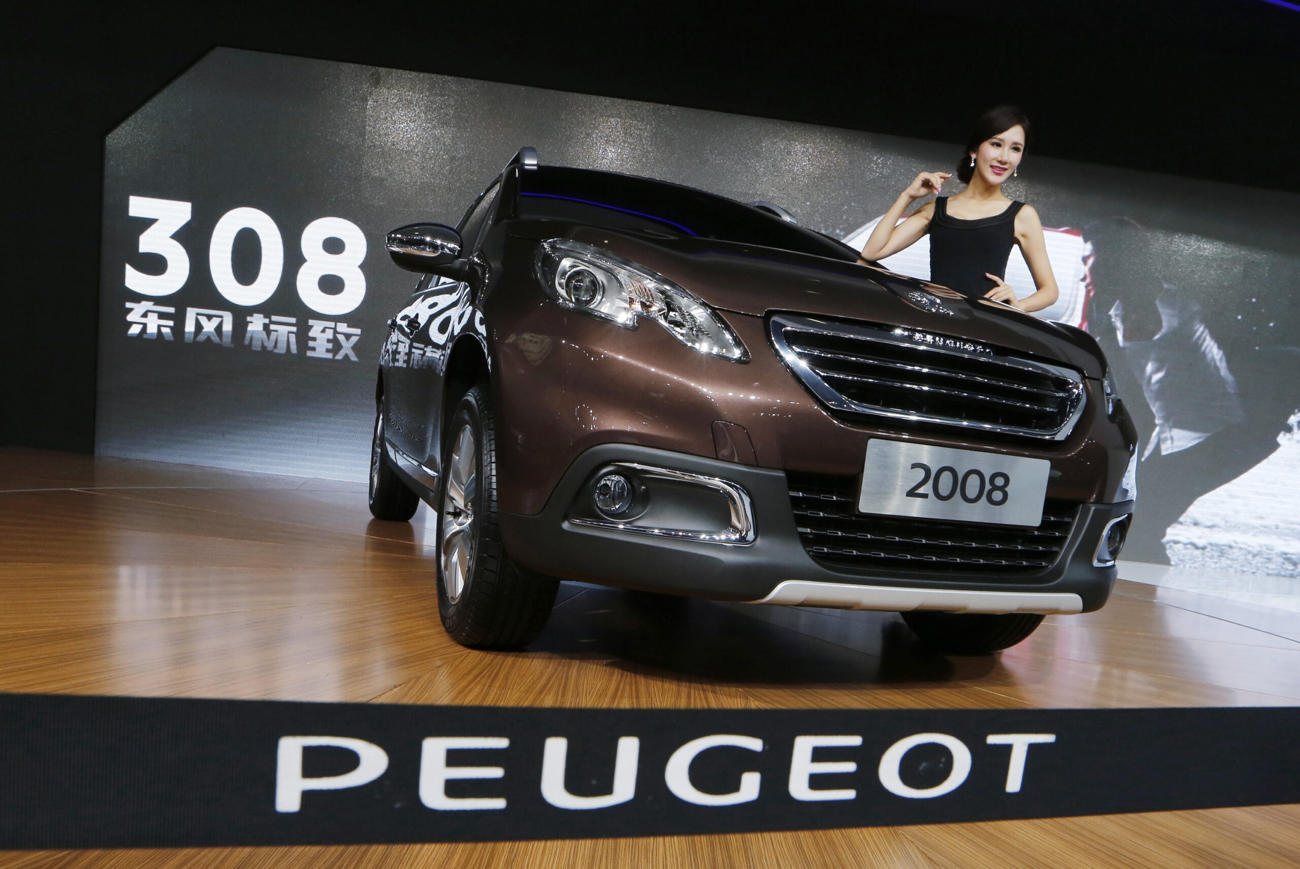 China’s Dongfeng, French state invest in Peugeot