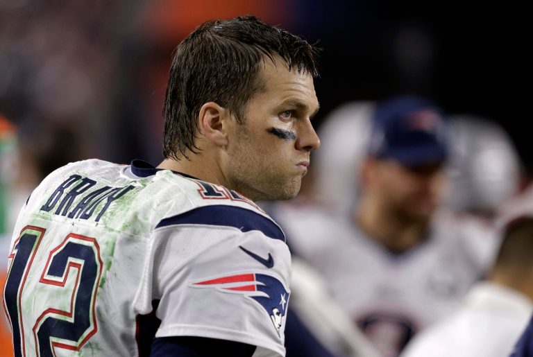 New England Patriots quarterback Tom Brady (12) watches from the sideline during the second half of NFL Super Bowl XLIX football game against the Seattle Seahawks Sunday, Feb. 1, 2015, in Glendale, Ariz. (AP Photo/Patrick Semansky)