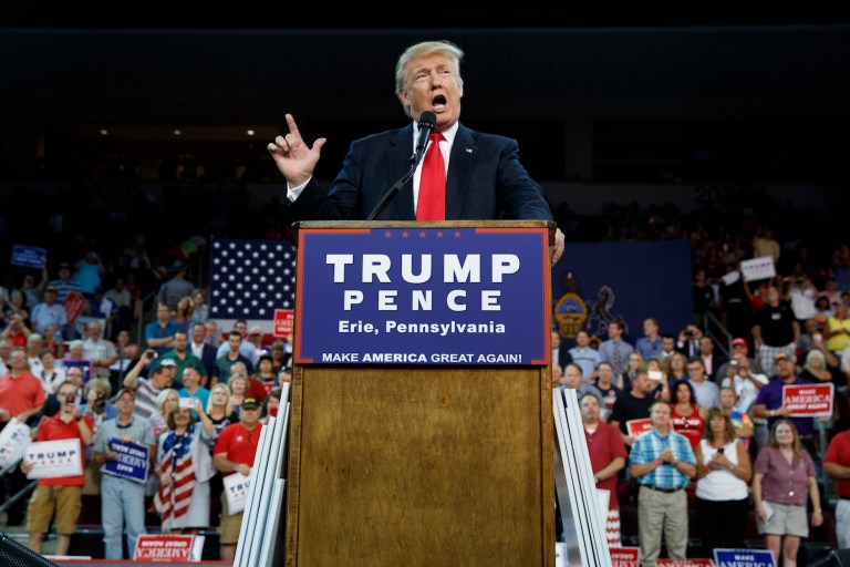 The Trump campaign staff on the call dodged a question about Trump's previous feud with Pope Francis. (AP Photo/Evan Vucci, File)