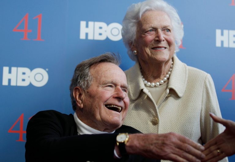   FILE - In a Tuesday, June 12, 2012 file photo, former President George H.W. Bush, and his wife former first lady Barbara Bush, arrive for the premiere of HBO's new documentary on his life near the family compound in Kennebunkport, Maine. The 41st president's month-long stay in a Houston hospital for treatment of a bronchitis-related cough appears to be nearing an end. A spokesman said Thursday, Dec. 20, 2012 that Bush possibly will be released from Methodist Hospital over the weekend and be home for Christmas. (AP Photo/Charles Krupa, File)  
